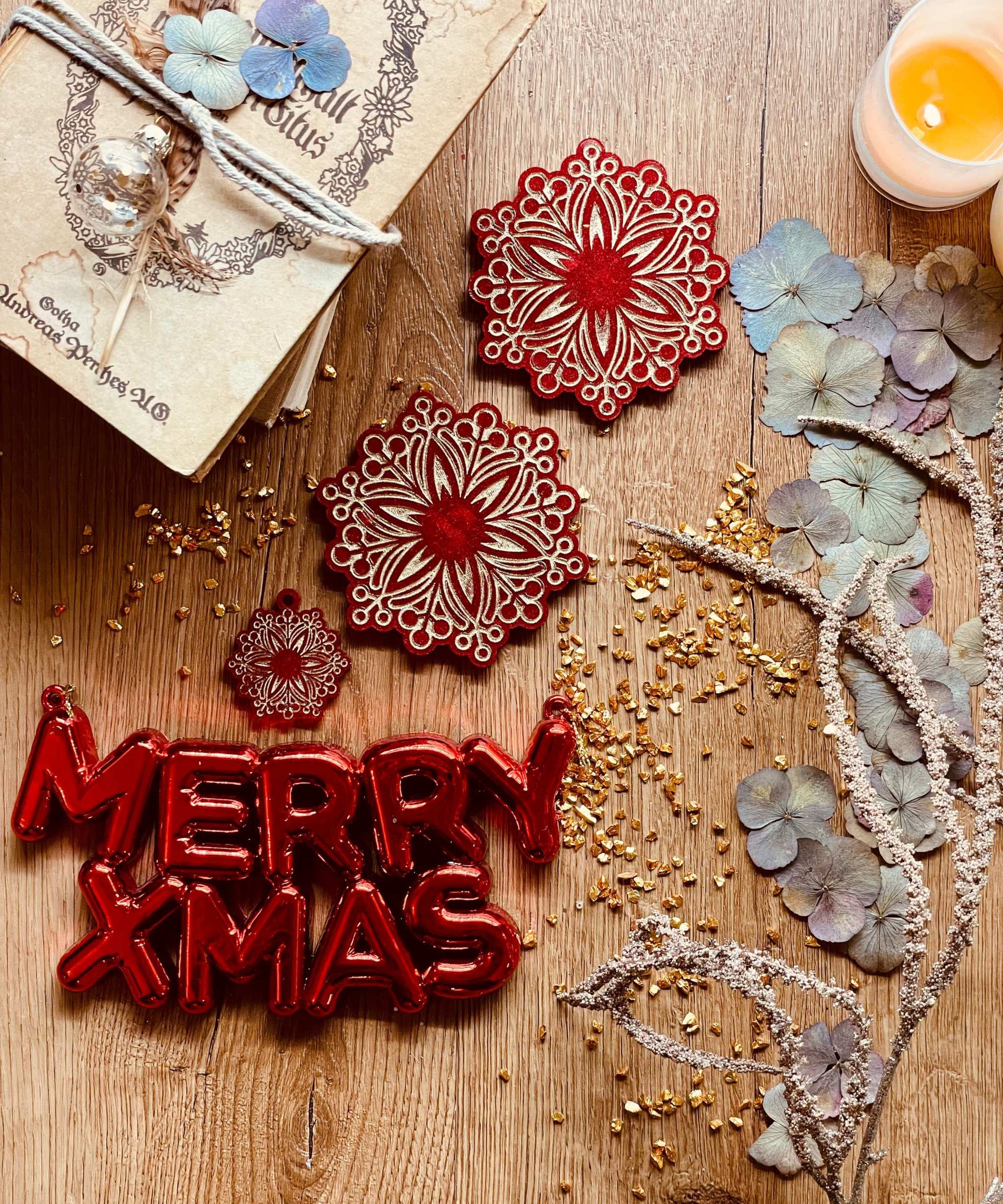 Handmade red and gold resin coasters for Christmas decor.