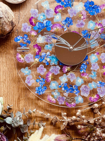 Resin clock with dried flowers and glitter