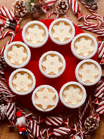XMas candle in handmade ceramic glass with star highlight
