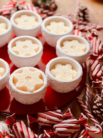 XMas candle in handmade ceramic glass with star highlight