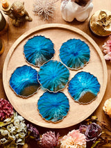 6 resin coasters in blue with silver in ocean design