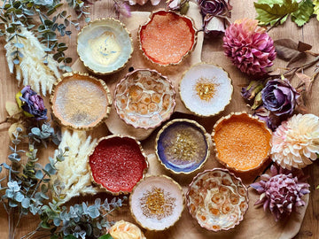 Resin jewelry bowls in various colors with gold