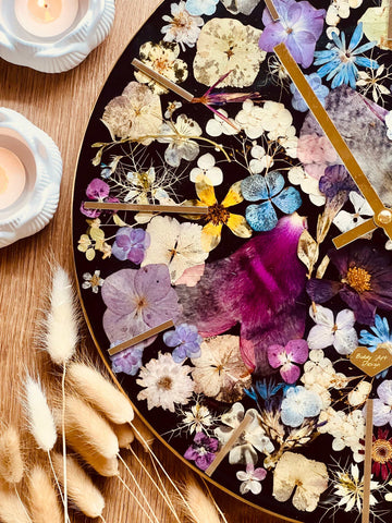 Resin clock with dried colorful flowers and hydrangeas