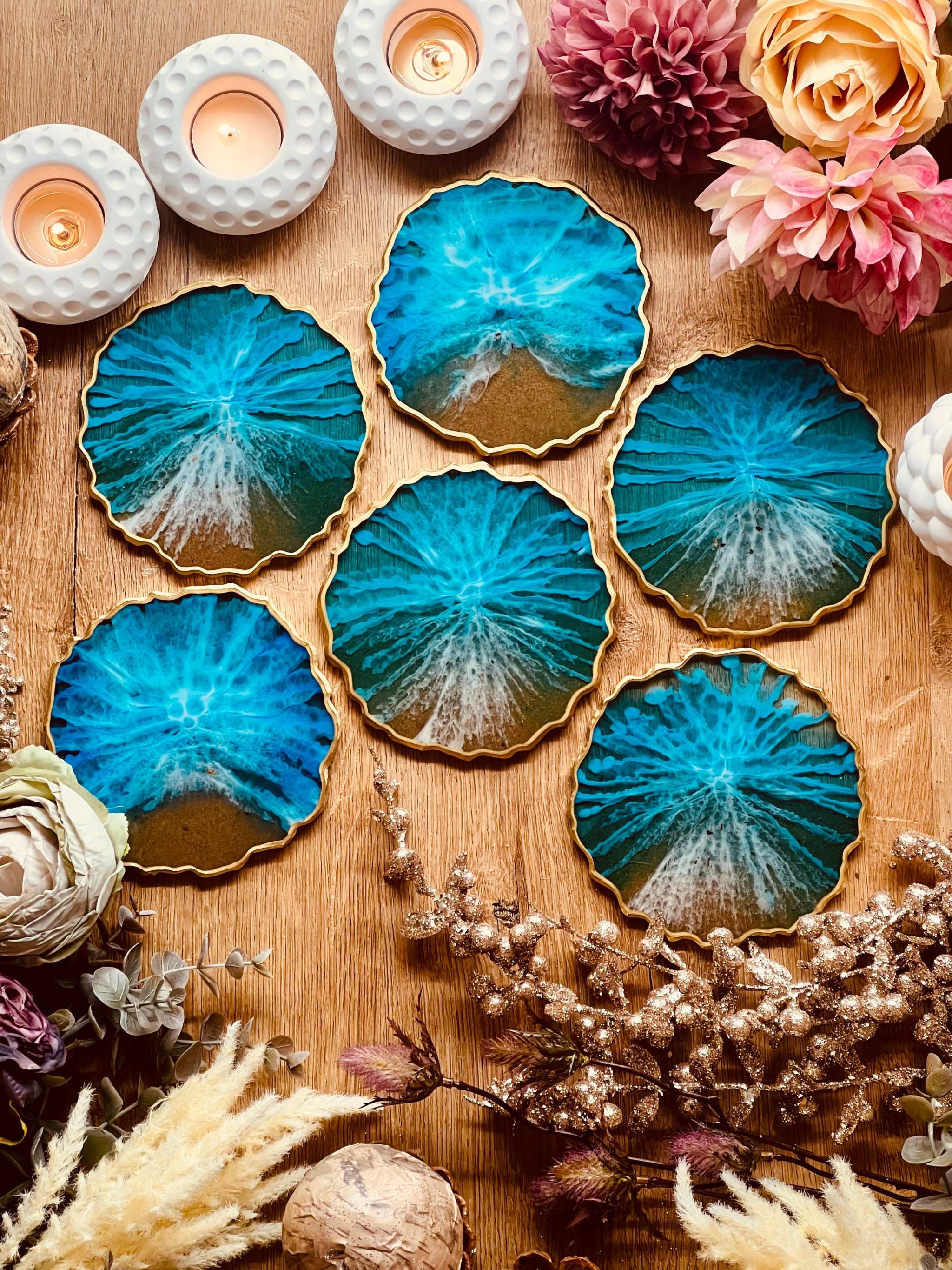 6 resin coasters in blue with gold in ocean design