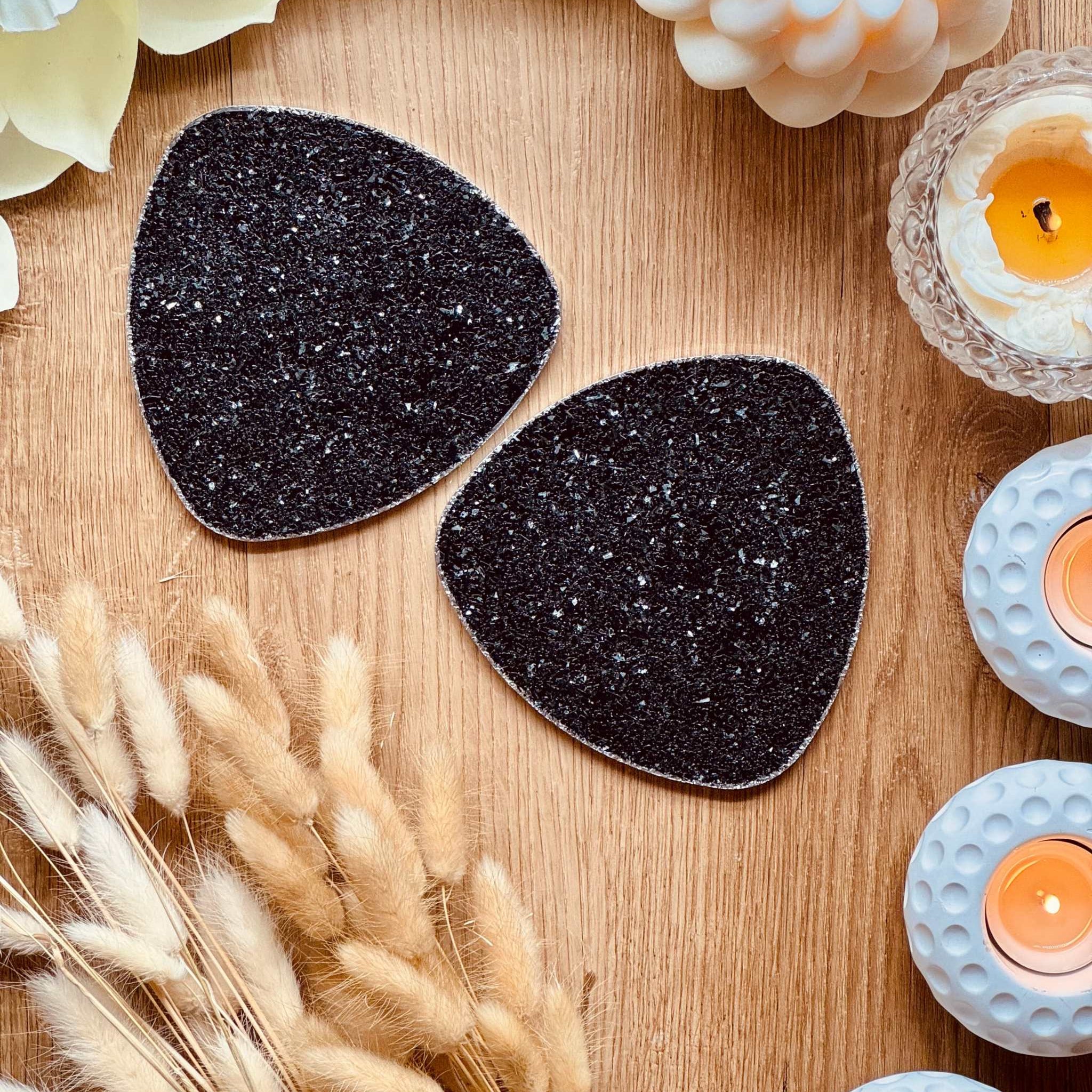 2 resin coasters in black silver with glitter surface