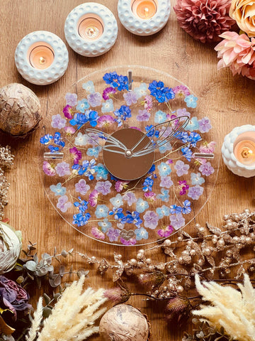 Resin clock with dried flowers and glitter