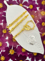 Elegante Etagerenstange in Gold als Highlight im Interior