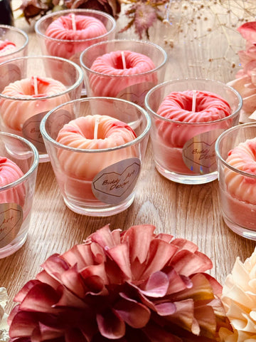 scented candle in a glass with donut highlight