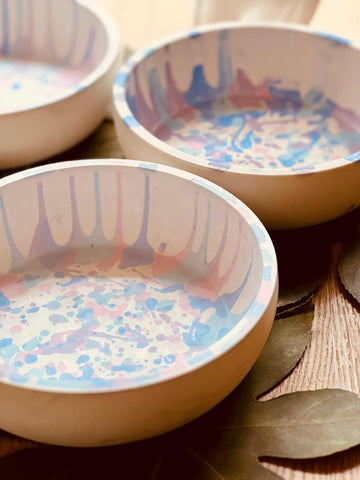 Cast ceramic bowl with unusual, colorful design 