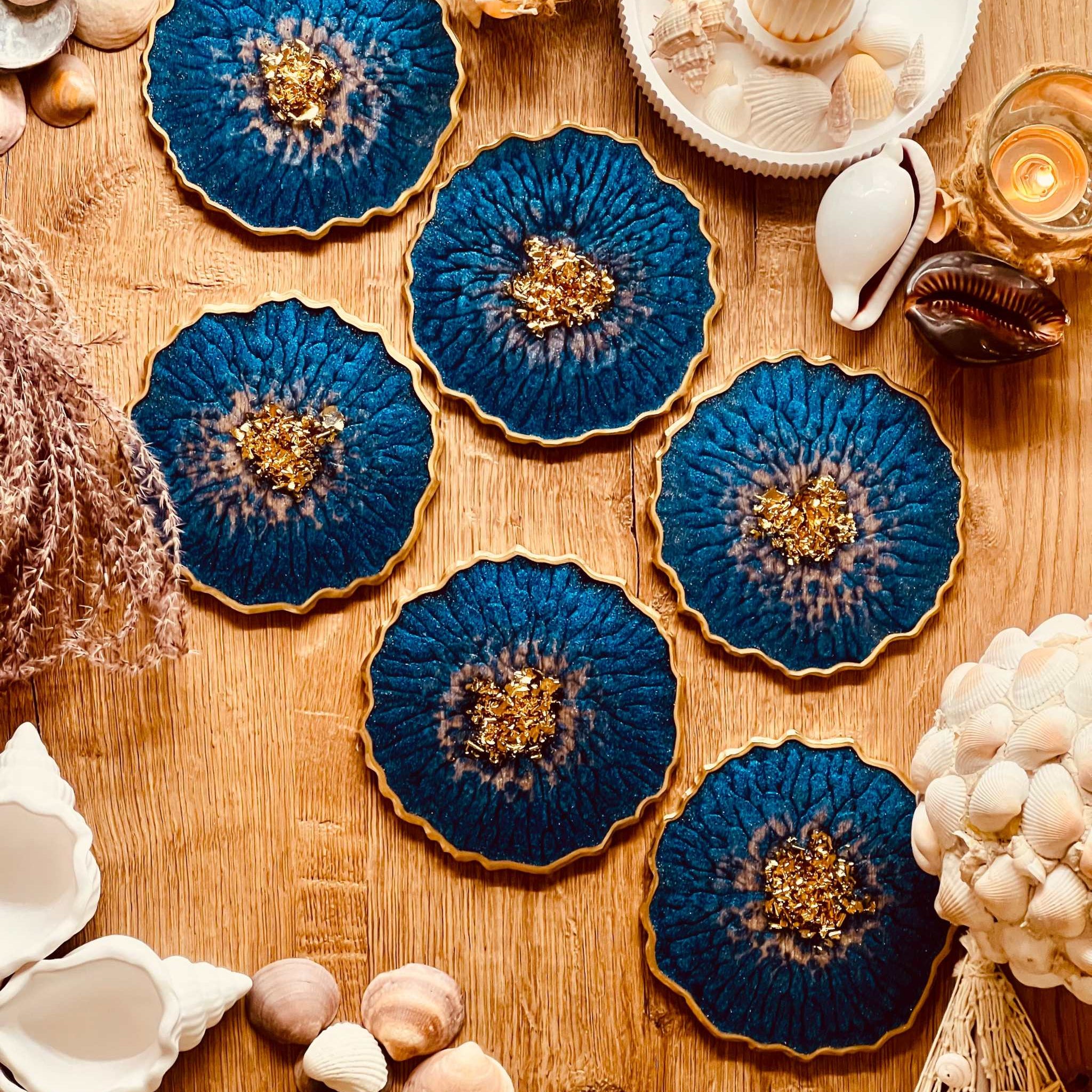 6 resin coasters in blue with silver