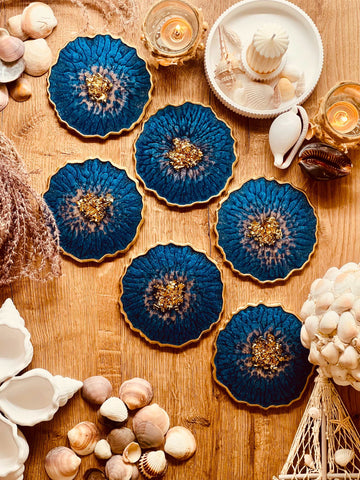 6 resin coasters in blue with silver