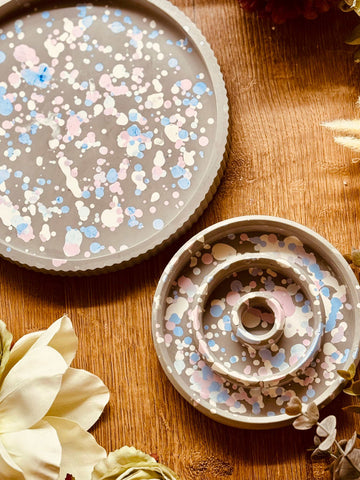 Cast ceramic tray and candle holder in a modern, colorful design