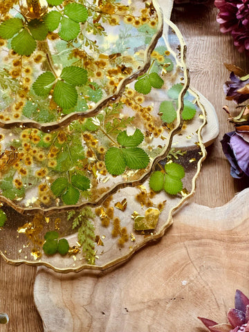 Resin cake stand with dried flowers, strawberry leaves with acacia and gold leaf