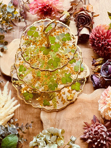 Resin cake stand with dried flowers, strawberry leaves with acacia and gold leaf