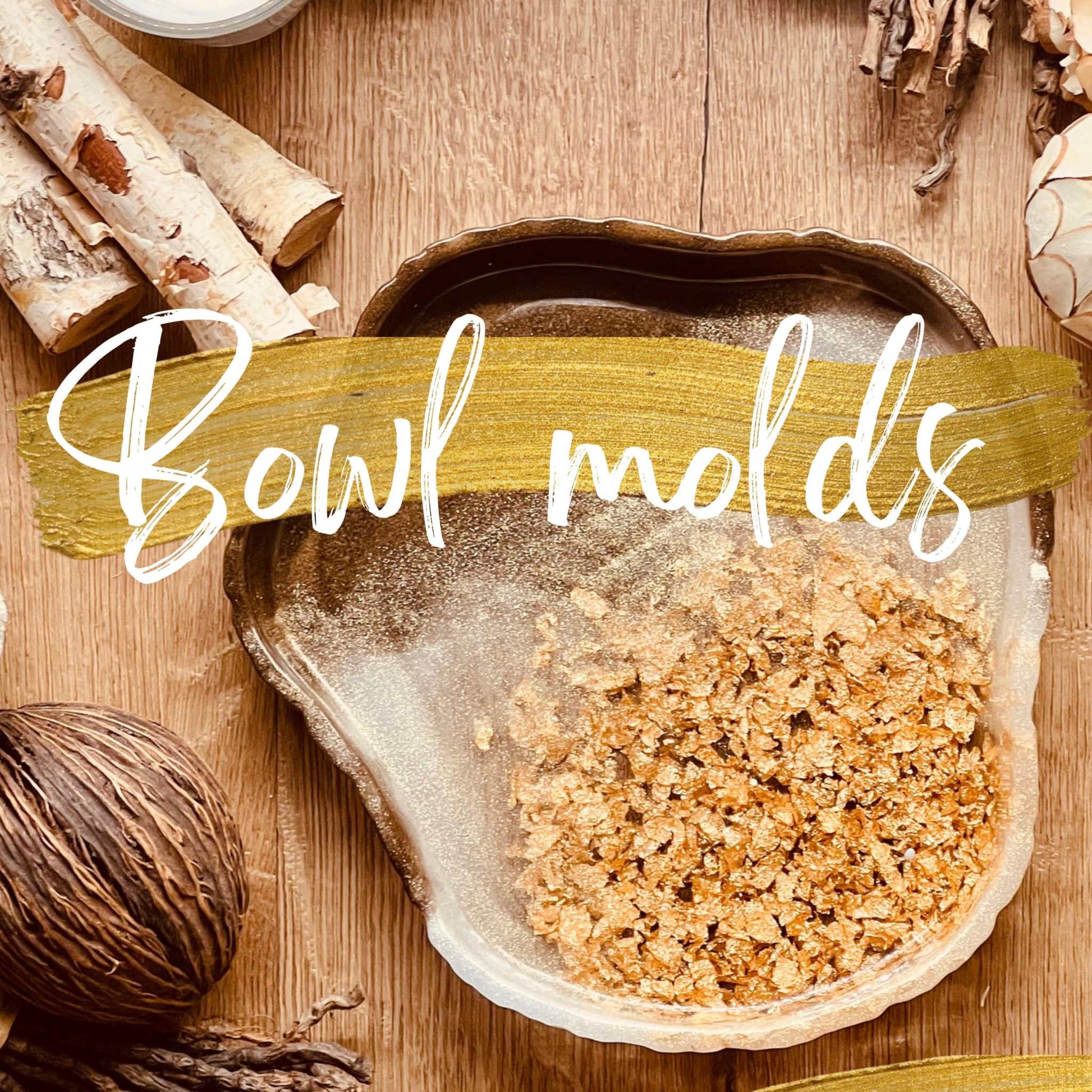 Resin art bowl molds with golden flakes on wooden surface, showcasing craftsmanship techniques from Resin Art Onlinekurs.
