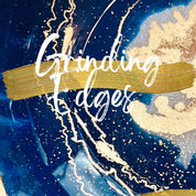 Close-up of a vibrant resin artwork with swirling blue and gold patterns, featuring the text "Grinding Edges."