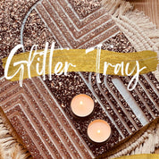 Resin art glitter tray with candles in a decorative design for online course promotion.