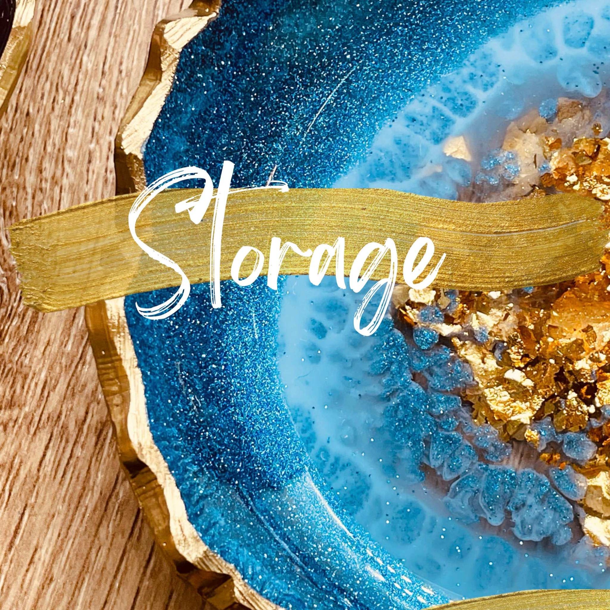Resin art creation with blue and gold details, showcasing texture and color blending.