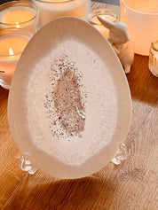 Handmade white resin Easter egg ornaments with silver and holographic surface.