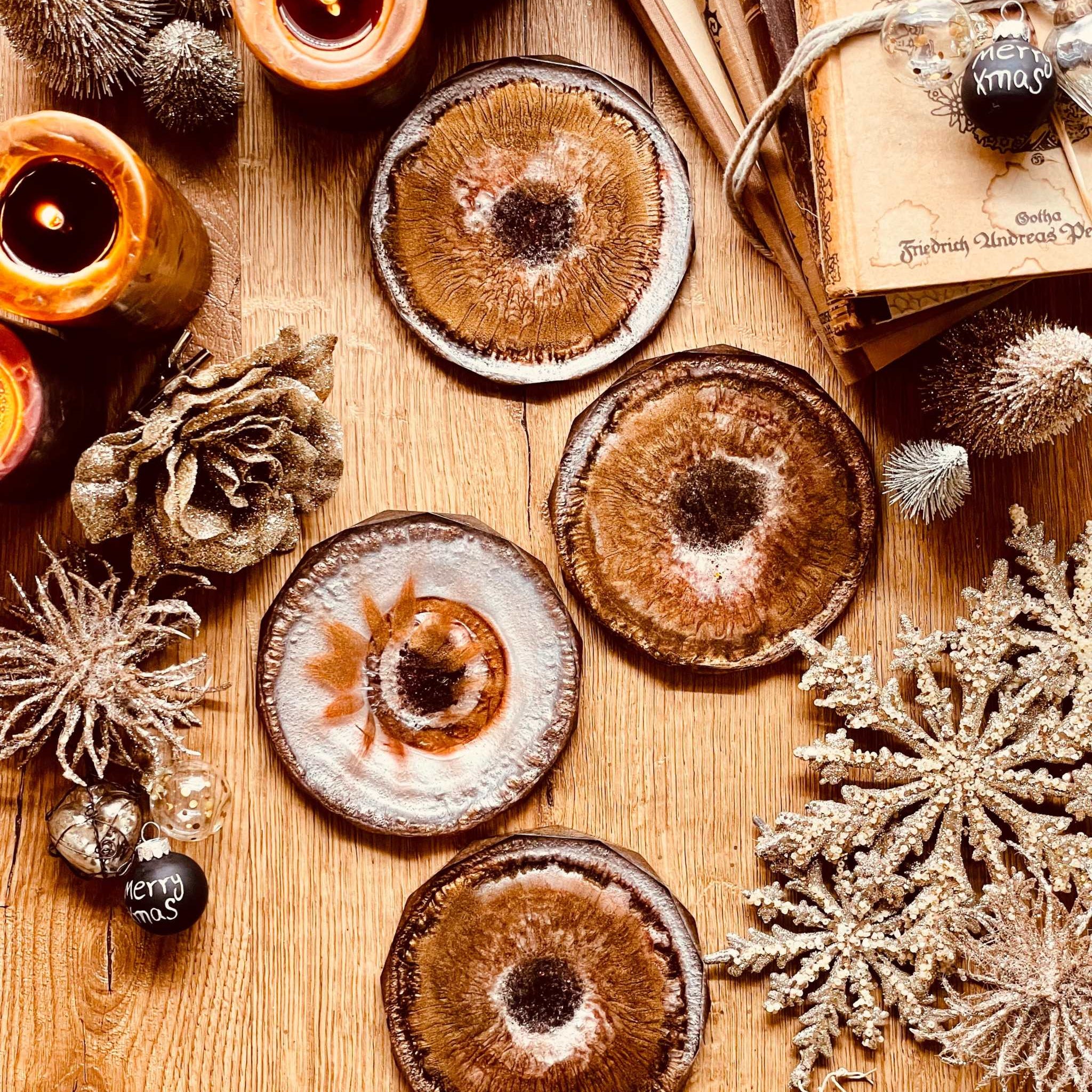 4 resin coasters in earth tones