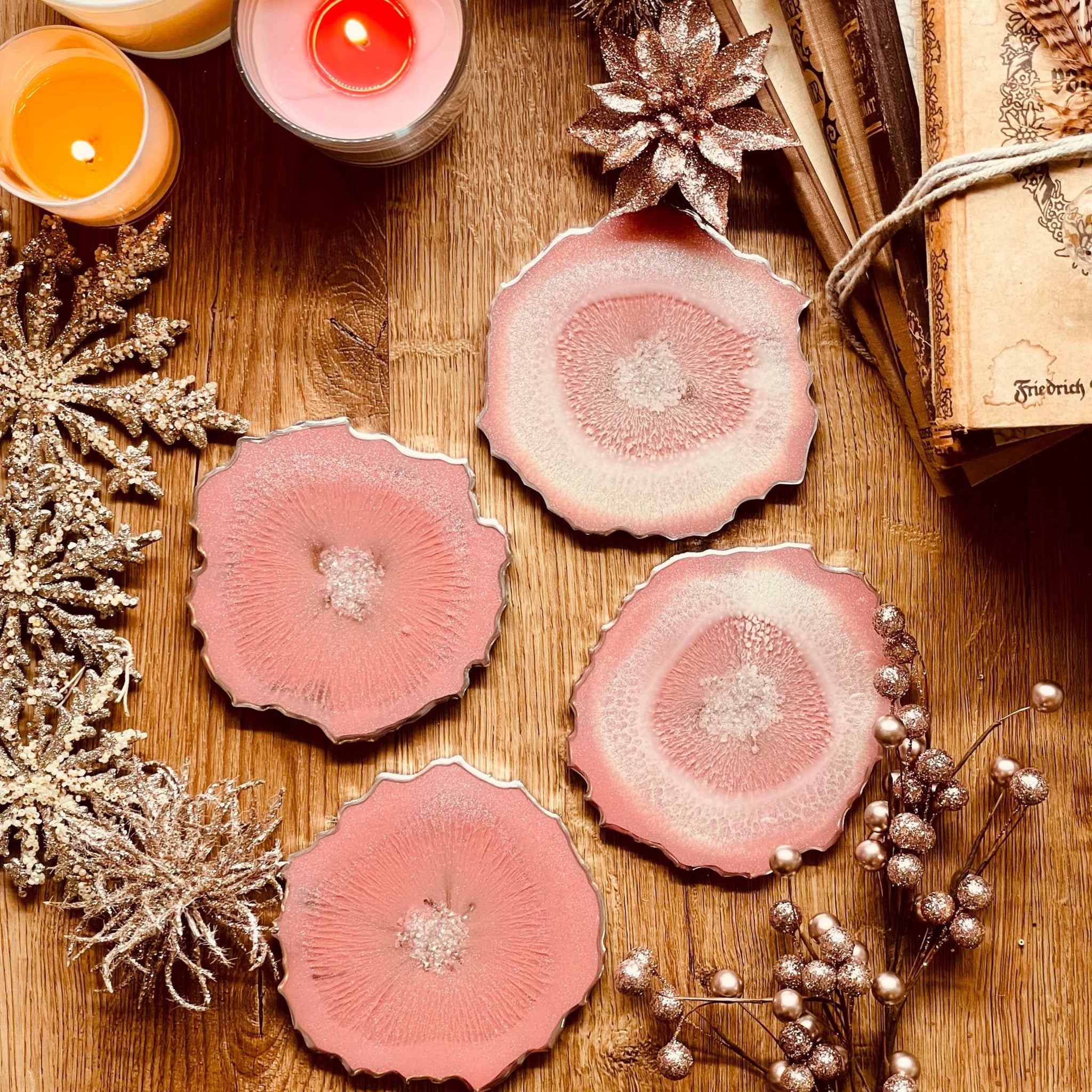 4 resin coasters in pink with silver