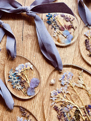 Handmade resin Easter egg ornaments with real dried plants.