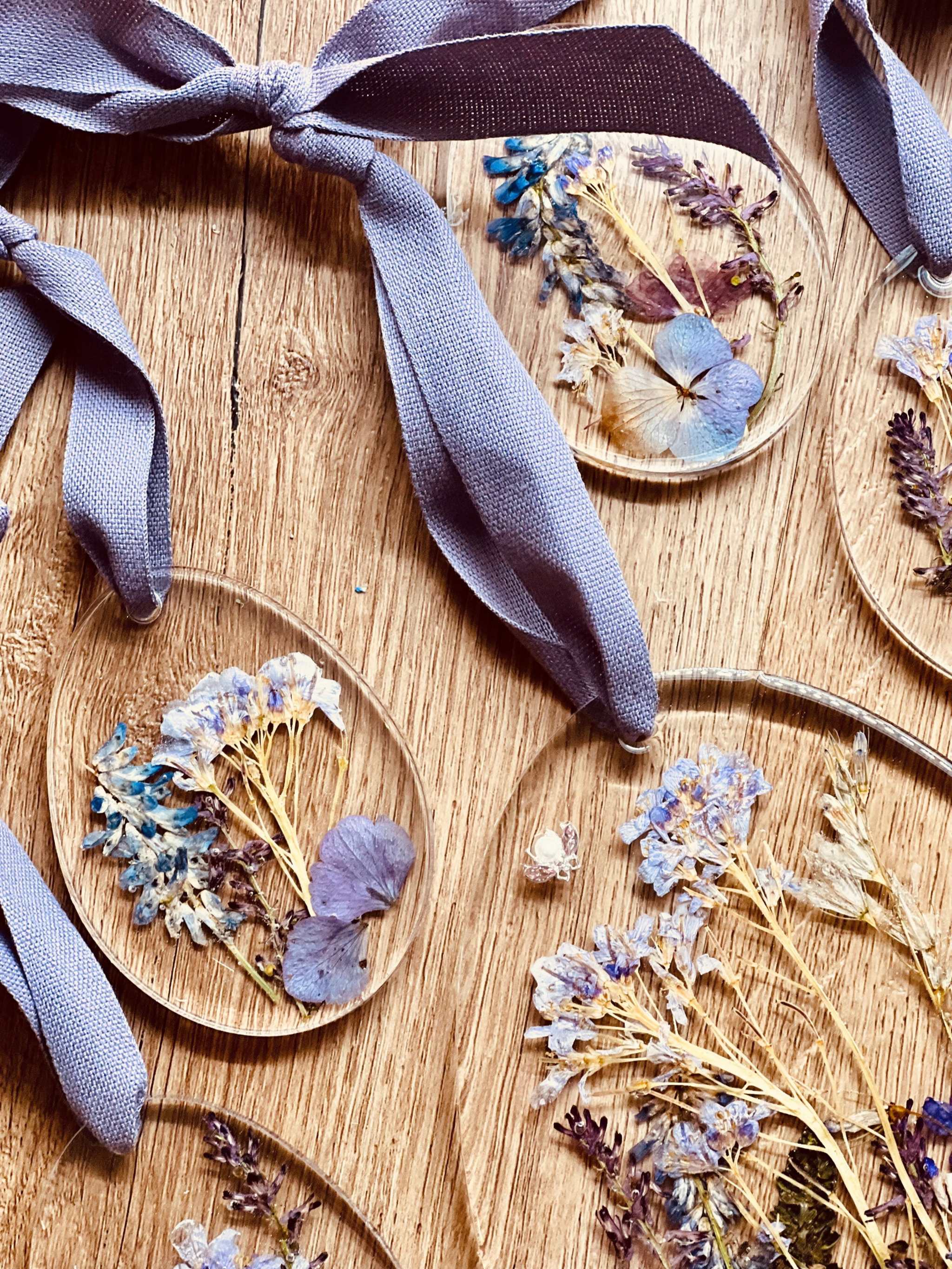 Handmade resin Easter egg ornaments with real dried plants.