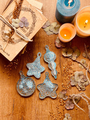 Handmade turquoise and silver resin Christmas tree ornaments, set of four.