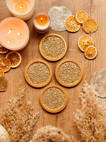 4 resin coasters in gold with diamond finish