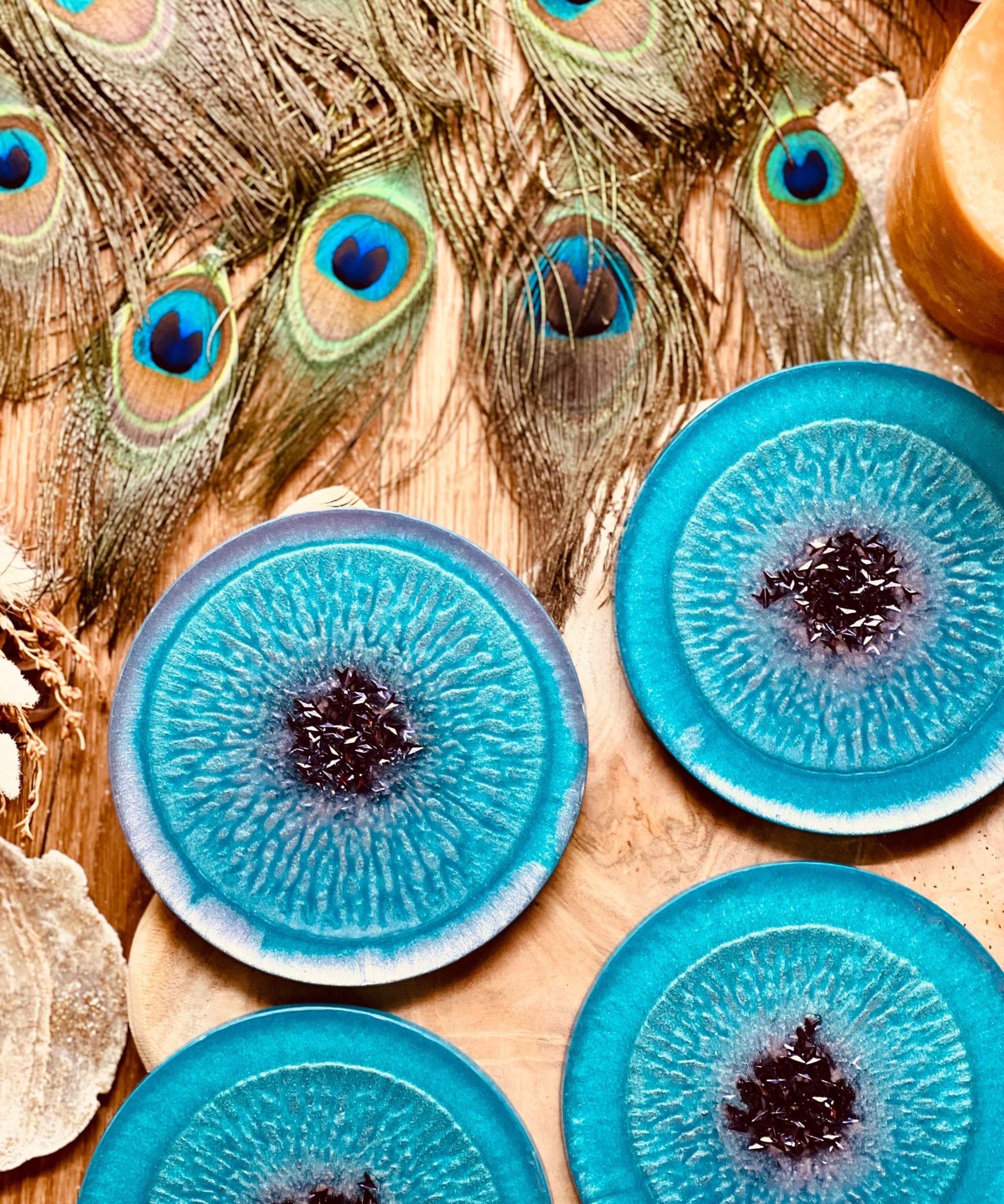 Handmade turquoise and purple resin coasters set of 6 on a wooden table.