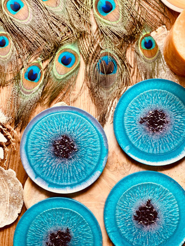 6 resin coasters in turquoise with purple