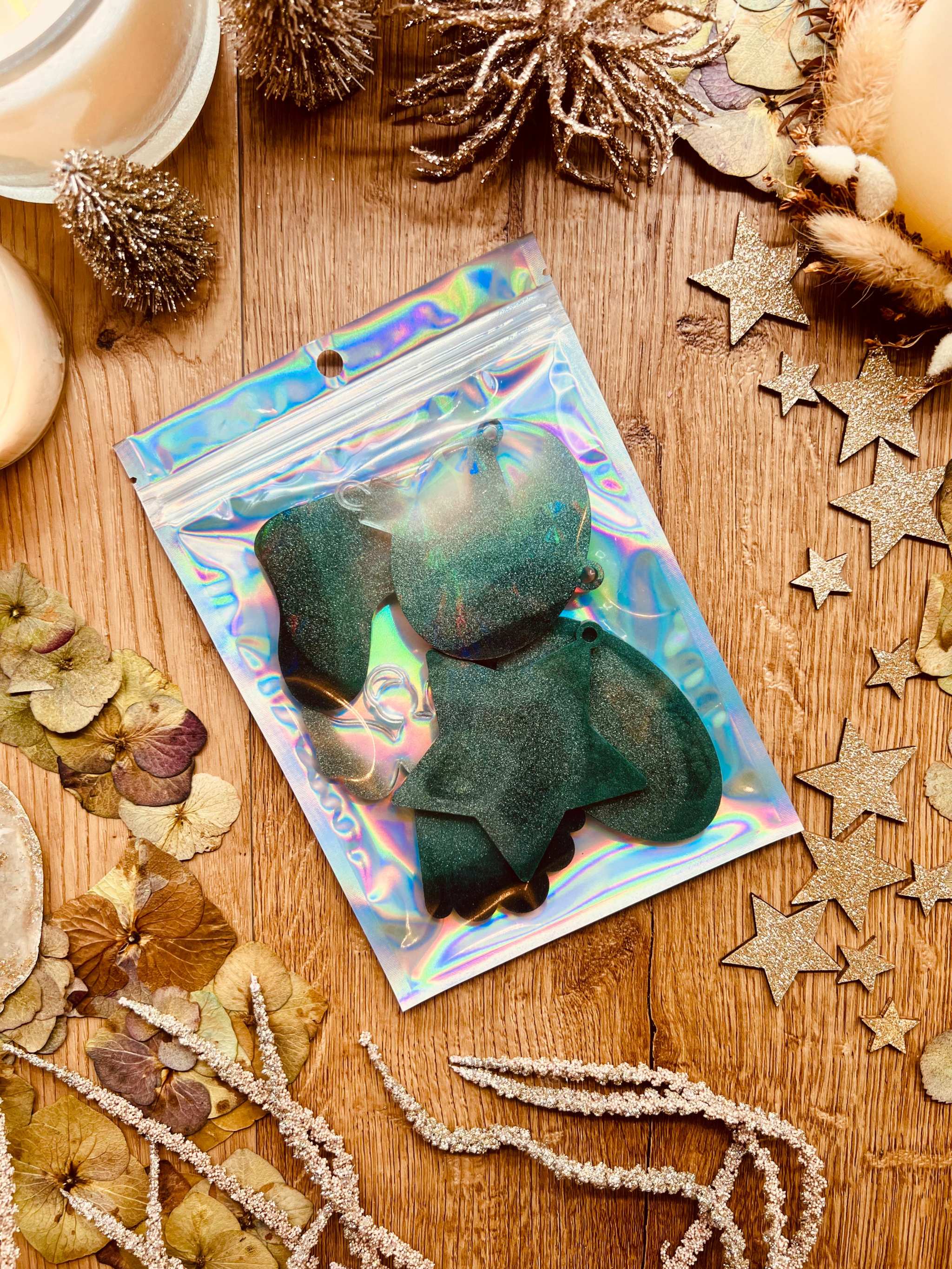 Handmade green resin Christmas tree ornaments with holographic finish, 5-piece set.