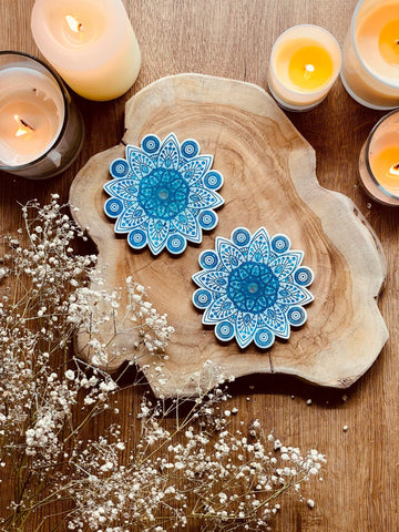 2 mandala resin coasters in white with blue