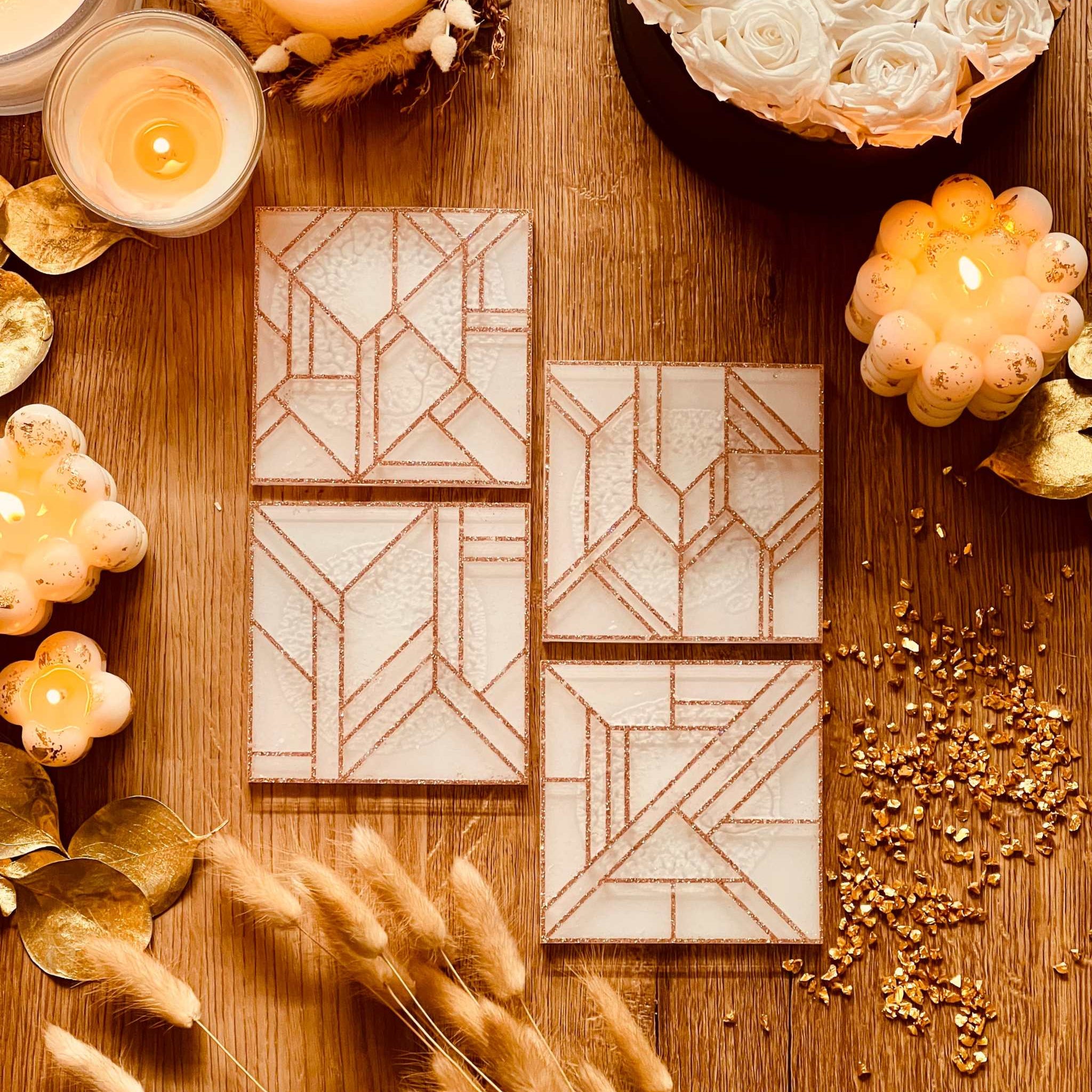 4 white resin coasters with gold 3D design