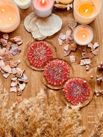 3 resin coasters in pink with silver