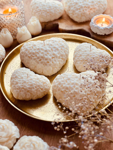 Sculpture heart shaped candles with flowers